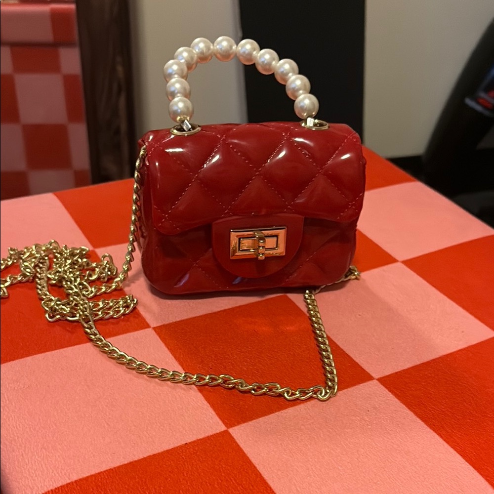 Red Quilted Handbag with Pearl Handle
